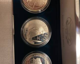 LOT 30
1994 three coin US Veterans silver dollar set