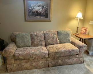 Sofa with floral upholstery