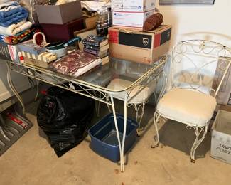 Wrought iron table w glass top and 4 chairs