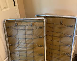 2 more folding cots