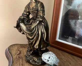 Bronze girl sculpture, white owl