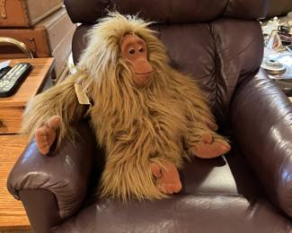 Orangutang on leather recliner