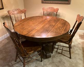 Antique oak pedestal table with 54" dia. and 4 chairs