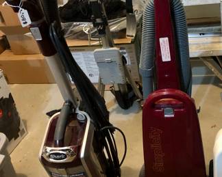 Vacuum cleaners.