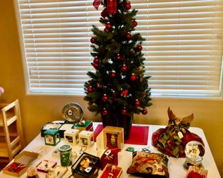Decorated Small Christmas Tree, Assorted Collectible Ornaments and a Smithsonian Angel Tree Topper.