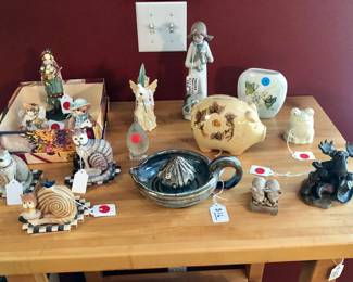 Collectibles, including Casades Girl with kittens figurine. Also hand thrown pottery citrus squeezer