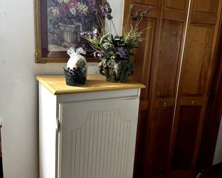 Wooden Cabinet, Wall Art, and Flower Pot