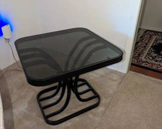 smokey black glass side table