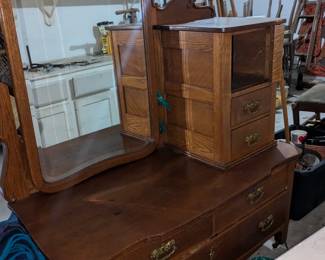 Oak dresser with a beveled mirror