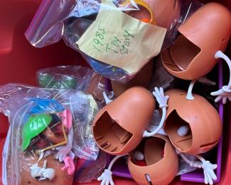 Many vintage Potato Head set and pieces including Santa, fireman and Toy Story.