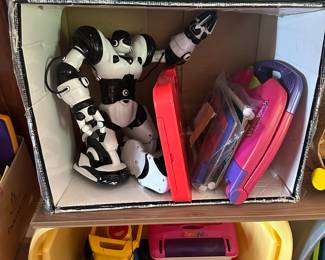 Vintage electronics from Tonka, Lite Brite, Fisher Price, and robots. 