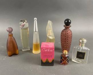 Lot 311 | Salvatore Ferragamo , Issey Miyaki, Donna Karen
