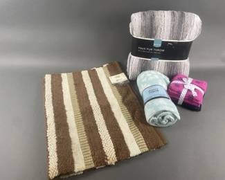 Lot 19 | New Throws, Washcloths & Rug
