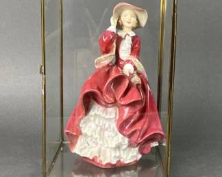 Lot 435 | Royal Doulton Top of the Hill Lady
