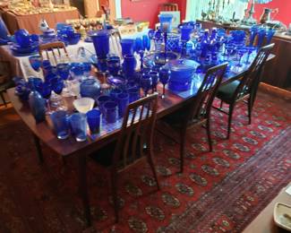 Danish modern rosewood dining table set Including 8 "Eva" Chairs by Niels Koefoed w/ 3 leaves and pads 