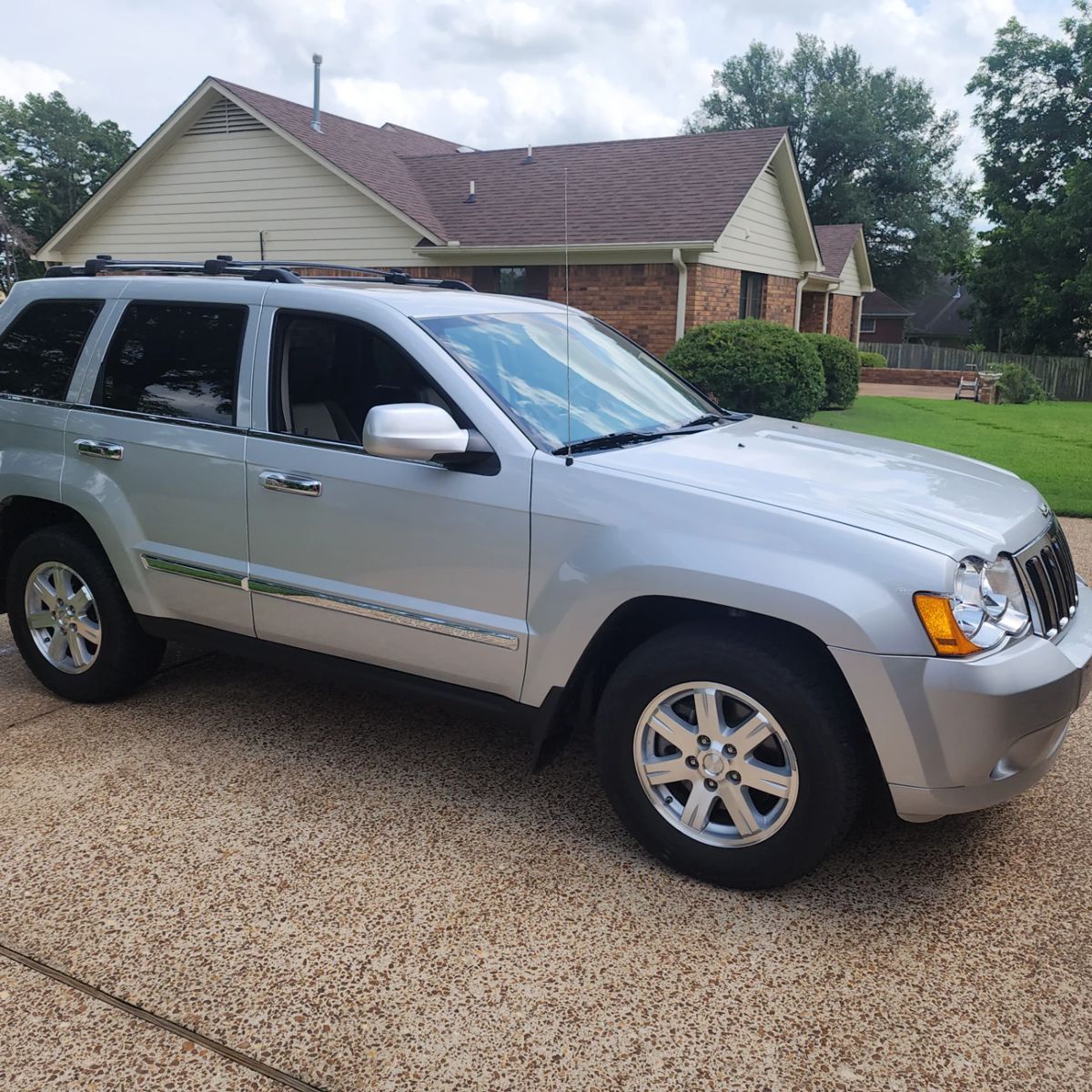Taking bids on 2010 Grand Jeep Cherokee with 5k original miles on it. Mint shape !