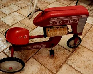 Antique pedal tractor
