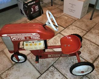 Antique toy pedal tractor