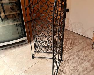 Arched Black Metal Wine Holder with Leaf Design