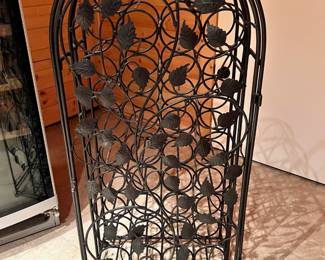 Arched Black Metal Wine Holder with Leaf Design