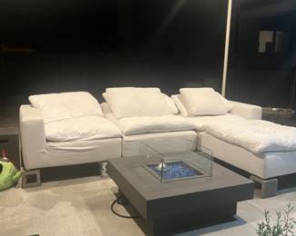 Night time on the patio. Propane powered fire pit and sectional sofa with washable slipcovers. 