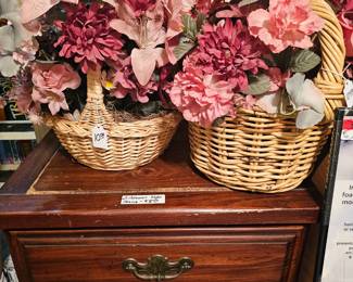 Decorative flower baskets and side table