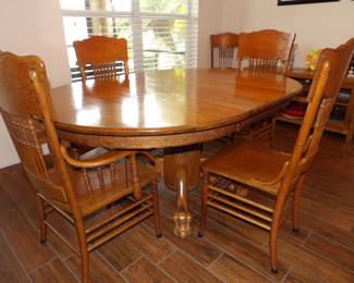Solid wood table with claw foot legs. Great condition!
