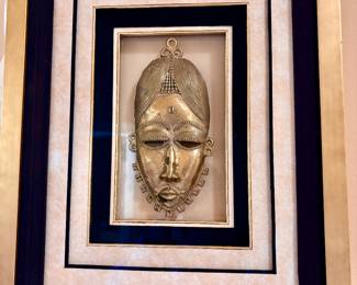 Distintive framed African Brass mask