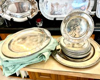 Silver charger with silver salad or dessert plates