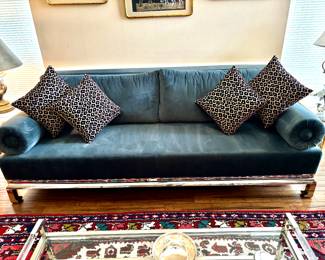 Sleek chrome trim sofa