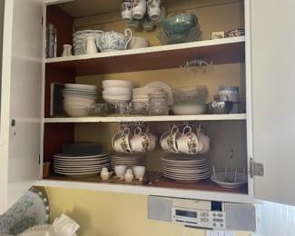 . . . china sets -- poached-egg set suspended on top shelf