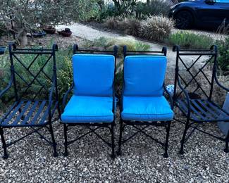 outdoor wrought iron chairs - excellent condition - w frontgate cushions for all 4 chairs - also in very good condition.