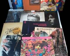11 Essential Rock Vinyl Records - Disraeli Gears Cream, Concert for Bangladesh by George Harrison, Black Sabbath I and Paranoid, Sticky Fingers Rolling Stones, David Bowie Changes One, Joan Baez, Neil Young After the Goldrush and Harvest, etc
