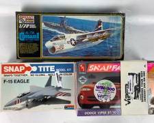 Three Model Kits Including an Unopened ETRL Dodge Viper RT/10, Minicraft US Navy A-7A Corsair 2, and A Snap Tite Model F-15 Eagle
