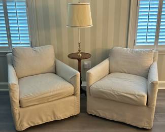 (2) Serena & Lily Slip Covered Swivel Armchairs