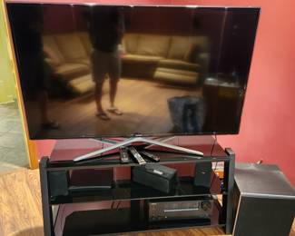 62 inch Samsung flat screen TV (Model UN60F6300AF). TV stand. Onkyo stereo receiver. Sound bar system