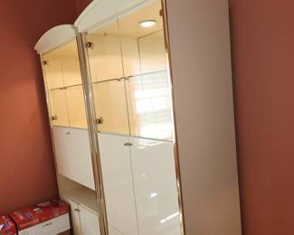 pair matching, lighted curio/storage cabinets.  VERY heavy.   EACH measures: 82" tall x 34" wide x 19 3/4" deep.  CABINETS ARE WIRED TOGETHER (one control for lighting)