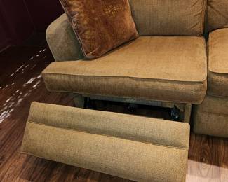 sectional sofa, both pieces at the ends have push-button extending leg rests. 97" long EACH SIDE