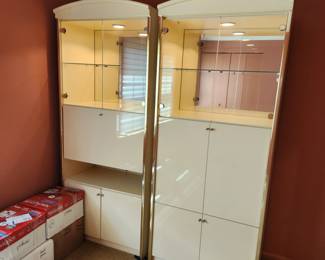 pair matching, lighted curio/storage cabinets.  VERY heavy.   EACH measures: 82" tall x 34" wide x 19 3/4" deep.  CABINETS ARE WIRED TOGETHER (one control for lighting)