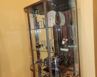 lighted, 5 shelf curio cabinet. ( NOT ALL ITEMS INSIDE ARE FOR SALE. Measures 78" tall x 44" wide