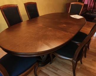 Dining table w/ 6 upholstered chairs, 2 leaves and pads.  By American Drew (purchased at Shofer's) Advocate Series.  Table measures: 100" long (WITH one 20" inserted) x 50" wide. available for pre-sale. $600.00 for table w/ chairs