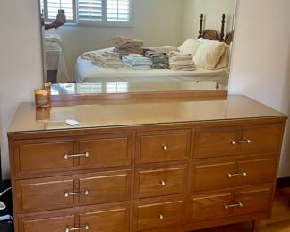 Mid Century 9 drawer Dresser w/ mirror. Pegged legs w/ brass capped feet. $385.