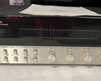 Lower Level:  A quality HARMON/KARDON 730 receiver includes its manual.