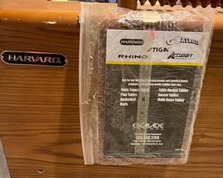 Lower Level:  The brochure is included with the HARVARD foosball table. 