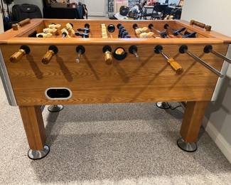 Lower Level:  This is a side view of the HARVARD foosball table.  It measures 55" x 33."