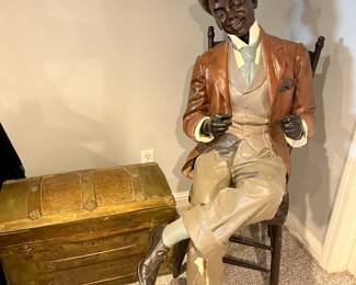 Lower Level:  Here is another photo of Waldo next to a small humpback trunk.  You can better see his size.