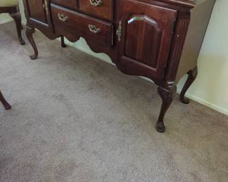 This buffet table is perfect for your table clothes and napkins and (more storage no one would think to look at ) . Like the pair of shoes you had to get but don't want "you know who " to see ! Just saying 