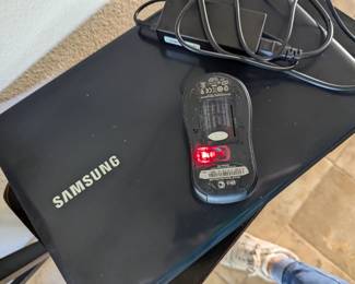 Laptop ready with a mouse and charger .. 