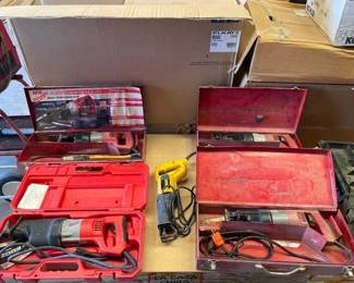 #2106 • 4 Milwaukee Sawzall and 1 Dewalt Sawzall
