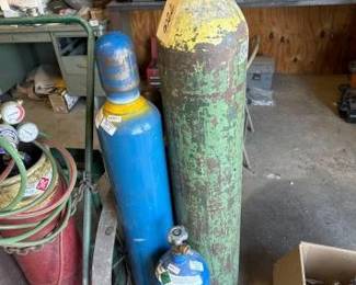 #2206 • (2) Nitrogen, (1) Oxygen, (1) Acetylene Tanks
